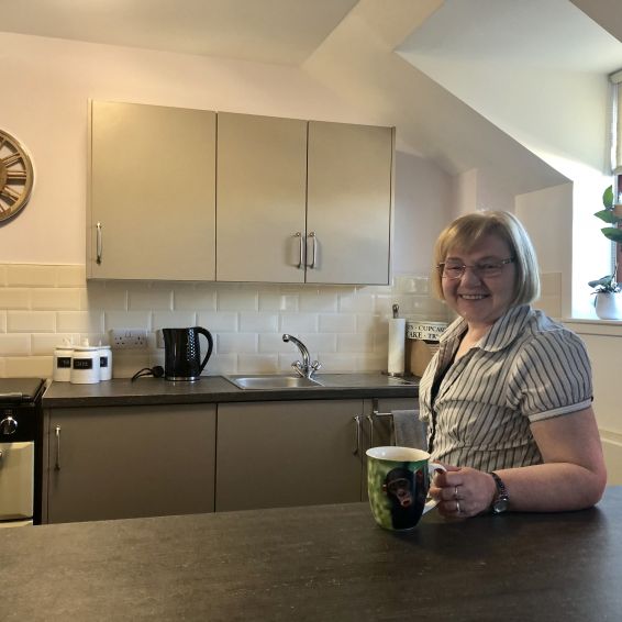 Elaine Edwards in her new kitchen