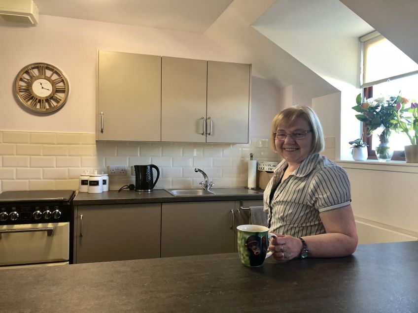 Elaine Edwards in her new kitchen